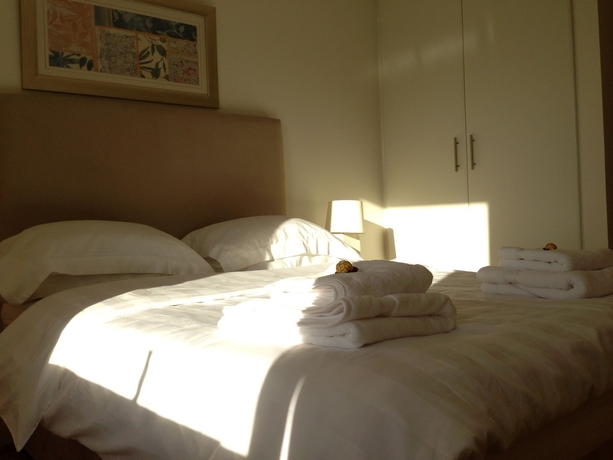 Imagen de la habitación del Hotel Vivid Apartments. Foto 3