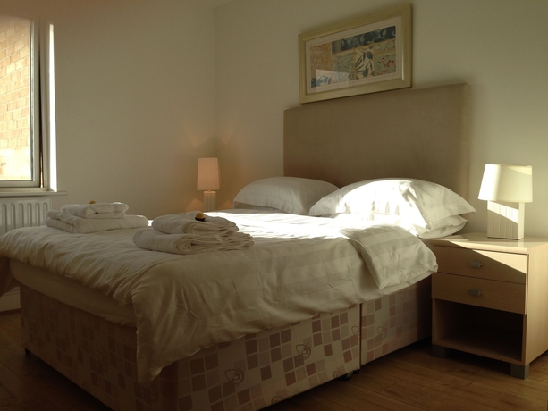 Imagen de la habitación del Hotel Vivid Apartments. Foto 5