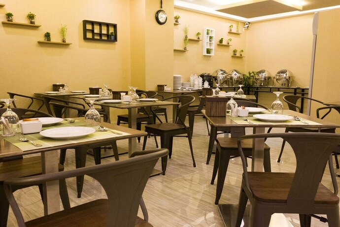 Imagen del bar/restaurante del Hotel Vivien's Hotel. Foto 13