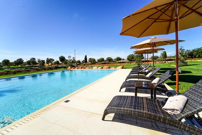 Imagen de la piscina del Hotel Vmg Horse Ranch. Foto 23