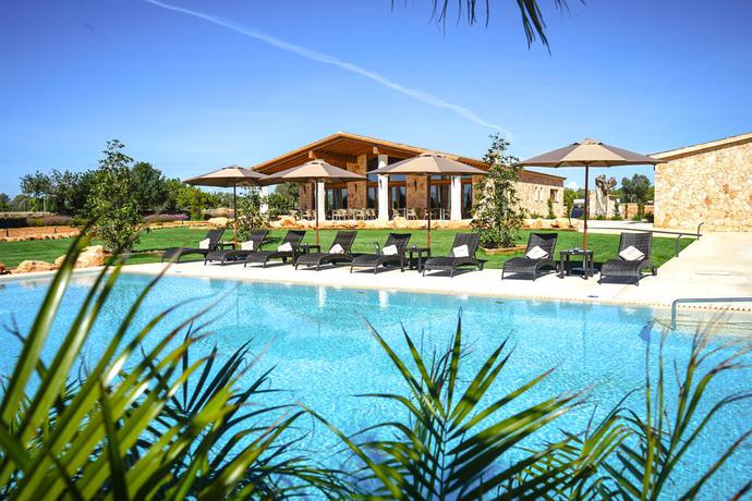 Imagen de la piscina del Hotel Vmg Horse Ranch. Foto 24