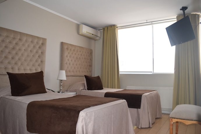 Imagen de la habitación del Hotel Vo Barrio Italia. Foto 5