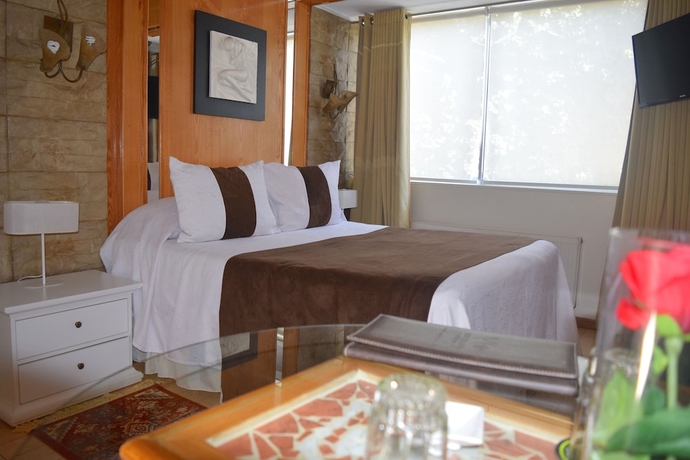 Imagen de la habitación del Hotel Vo Barrio Italia. Foto 10