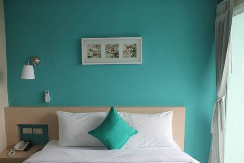 Imagen de la habitación del Hotel V-ocean Palace Hat Yai. Foto 11