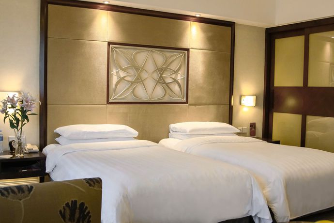 Imagen de la habitación del Hotel Voco Changzhou Fudu. Foto 2
