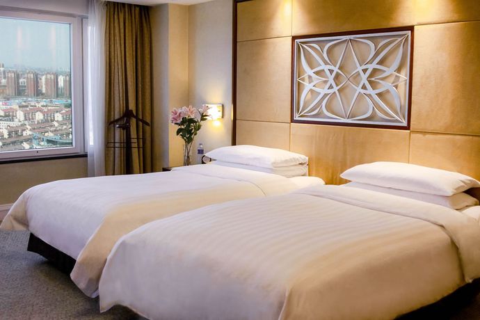 Imagen de la habitación del Hotel Voco Changzhou Fudu. Foto 3
