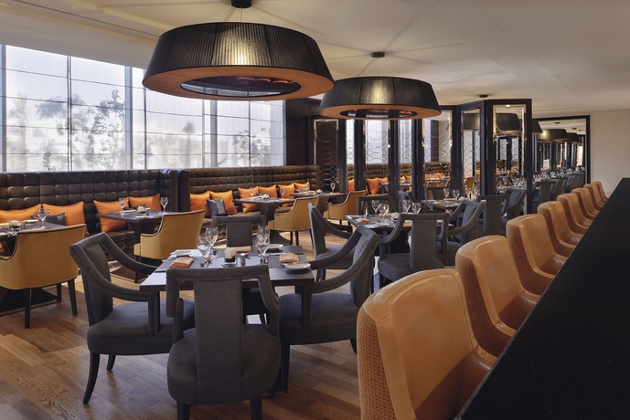 Imagen del bar/restaurante del Hotel Voco Riyadh, An Ihg. Foto 4