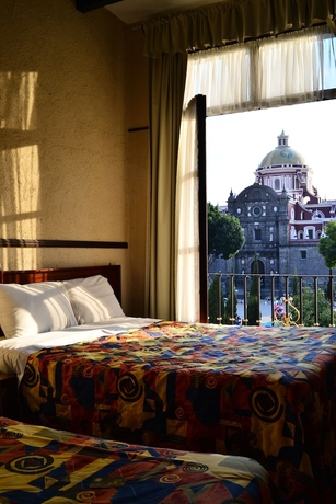 Imagen de la habitación del Hotel Voco Royalty Puebla Downtown, An Ihg. Foto 8