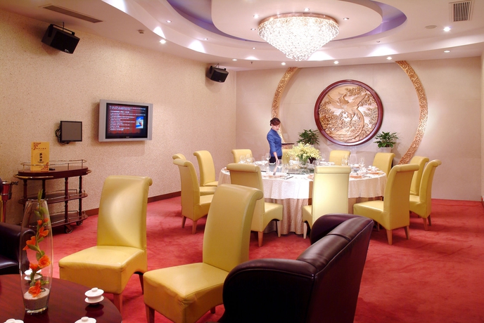 Imagen del bar/restaurante del Hotel Voco Wuhan Xinhua, An Ihg. Foto 5