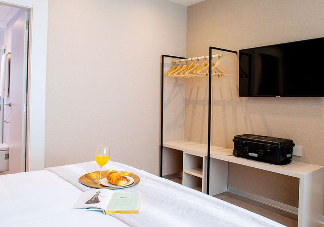 Imagen de la habitación del Hotel Voghe Premium Flats. Foto 9