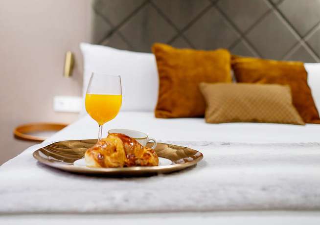 Imagen de la habitación del Hotel Voghe Premium Flats. Foto 13