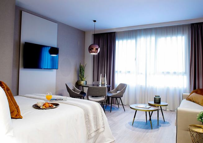 Imagen de la habitación del Hotel Voghe Premium Flats. Foto 16