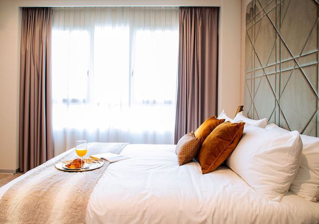 Imagen de la habitación del Hotel Voghe Premium Flats. Foto 18