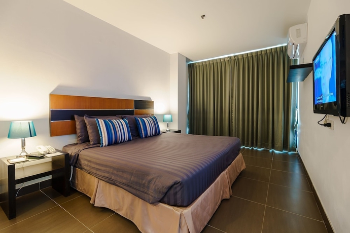 Imagen de la habitación del Hotel Vogue Pattaya. Foto 12