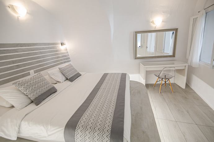 Imagen de la habitación del Hotel Vogue Suites. Foto 10