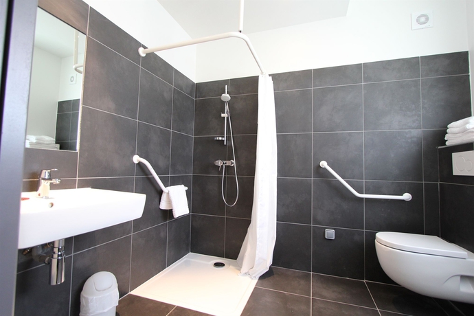 Imagen de la habitación del Hotel Vol De Nuit. Foto 5