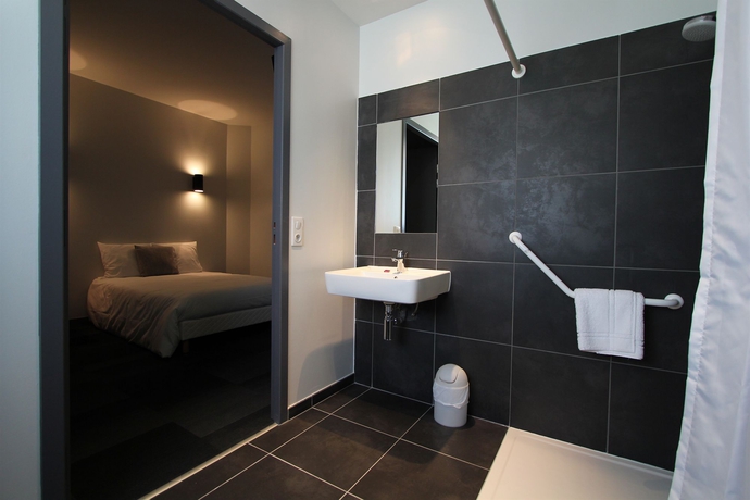 Imagen de la habitación del Hotel Vol De Nuit. Foto 7