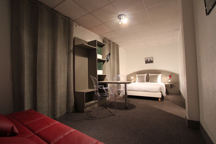 Imagen de la habitación del Hotel Vol De Nuit. Foto 11