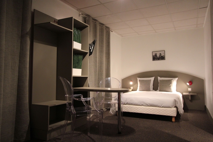 Imagen de la habitación del Hotel Vol De Nuit. Foto 12