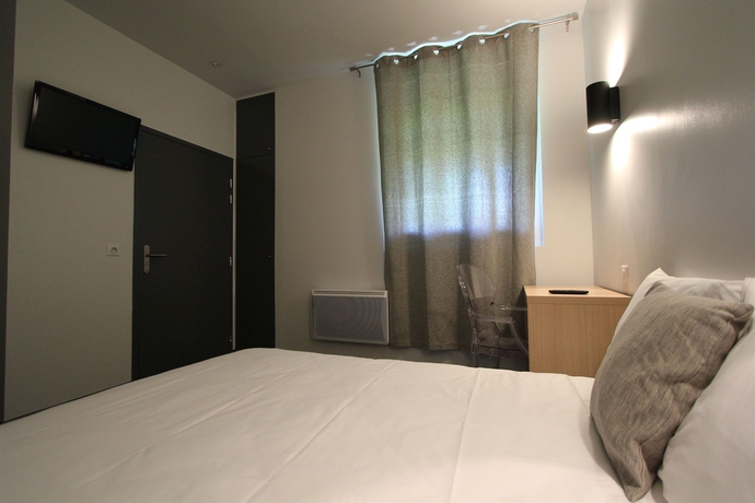 Imagen de la habitación del Hotel Vol De Nuit. Foto 14