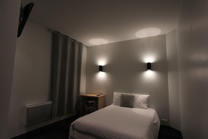 Imagen de la habitación del Hotel Vol De Nuit. Foto 15