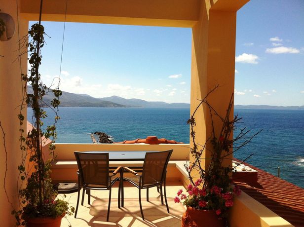 Imagen del bar/restaurante del Hotel Volissos Holiday Homes. Foto 3