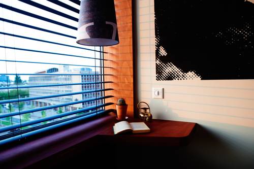 Imagen de la habitación del Hotel Volkshotel. Foto 14