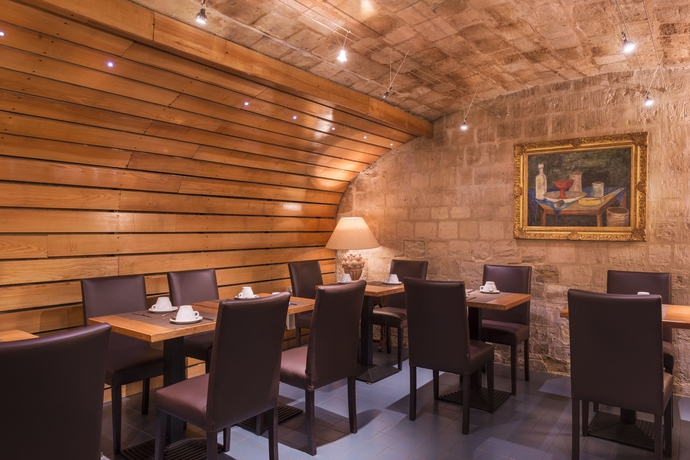 Imagen del bar/restaurante del Hotel Volney Opera. Foto 2