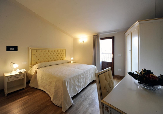 Imagen de la habitación del Hotel Volterra In. Foto 12