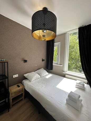 Imagen de la habitación del Hotel Vondel Garden. Foto 13