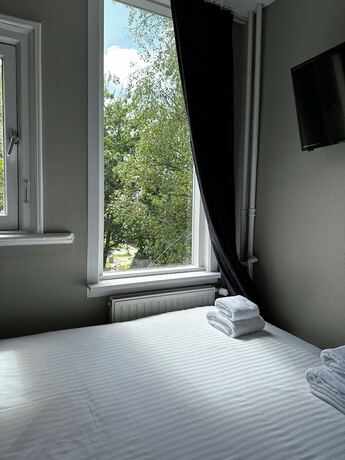 Imagen de la habitación del Hotel Vondel Garden. Foto 14