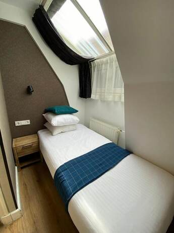 Imagen de la habitación del Hotel Vondel Garden. Foto 15