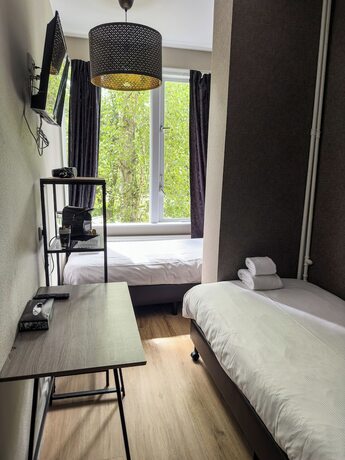 Imagen de la habitación del Hotel Vondel Garden. Foto 16