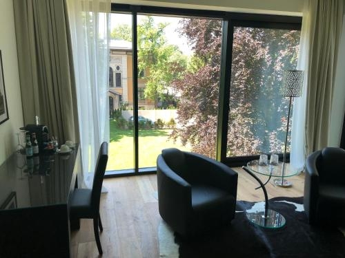 Imagen de la habitación del Hotel Voss Villa. Foto 9
