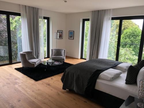 Imagen de la habitación del Hotel Voss Villa. Foto 10