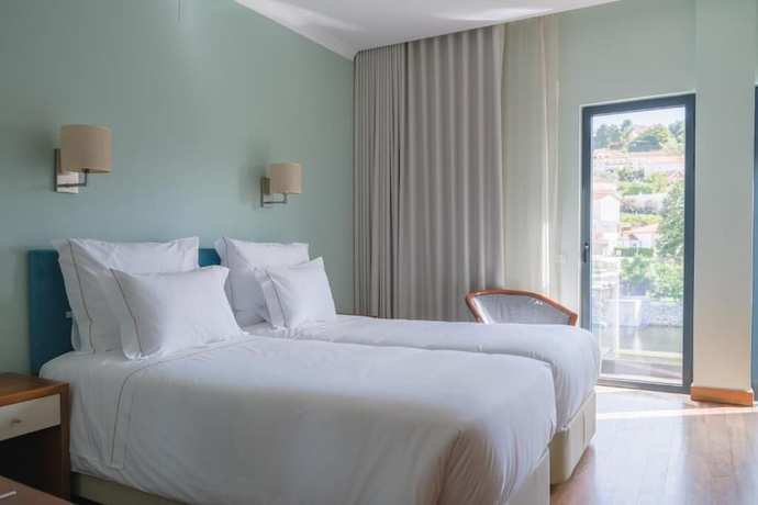 Imagen de la habitación del Hotel Vouga. Foto 6