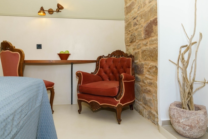 Imagen de la habitación del Hotel Voulamandis House. Foto 5