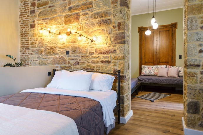 Imagen de la habitación del Hotel Voulamandis House. Foto 8