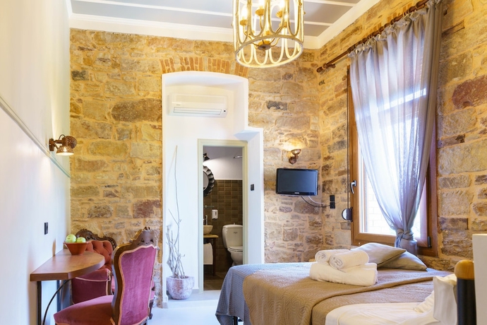 Imagen de la habitación del Hotel Voulamandis House. Foto 10