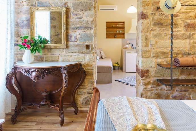 Imagen de la habitación del Hotel Voulamandis House. Foto 13