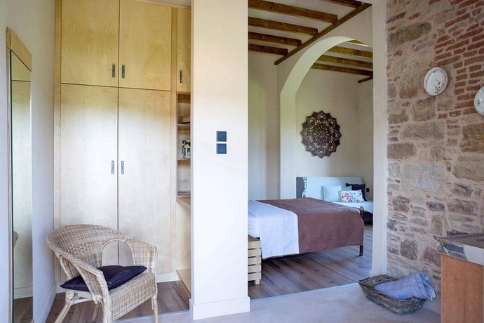 Imagen de la habitación del Hotel Voulamandis House. Foto 18