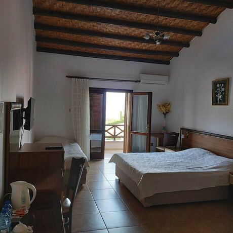 Imagen de la habitación del Hotel Vouni King. Foto 16