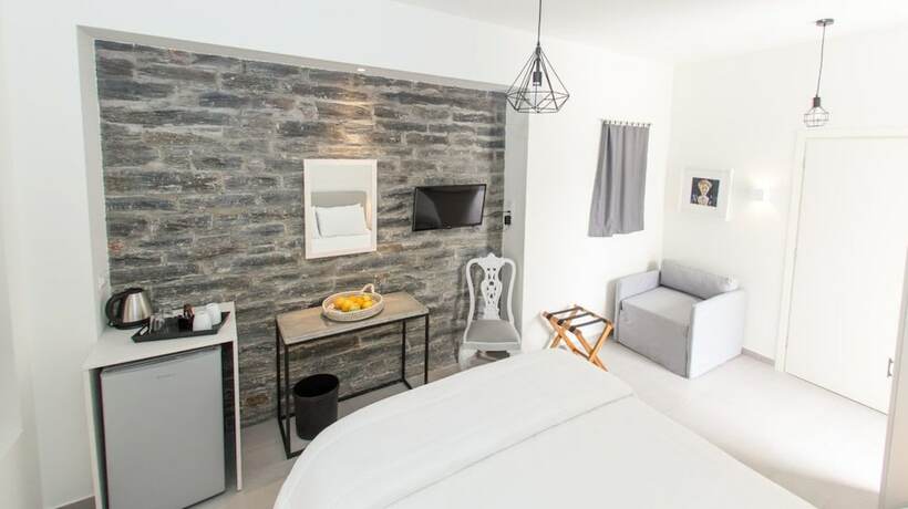 Imagen de la habitación del Hotel Vourkari Village. Foto 15