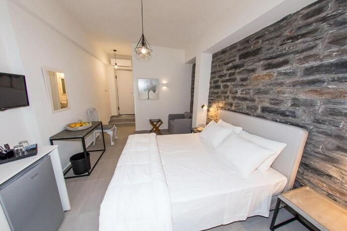 Imagen de la habitación del Hotel Vourkari Village. Foto 18