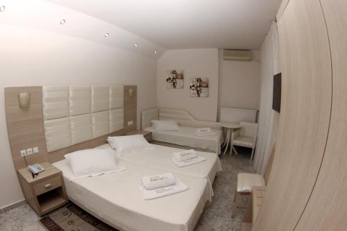 Imagen de la habitación del Hotel Vournelis Beach Hotel and Spa. Foto 9