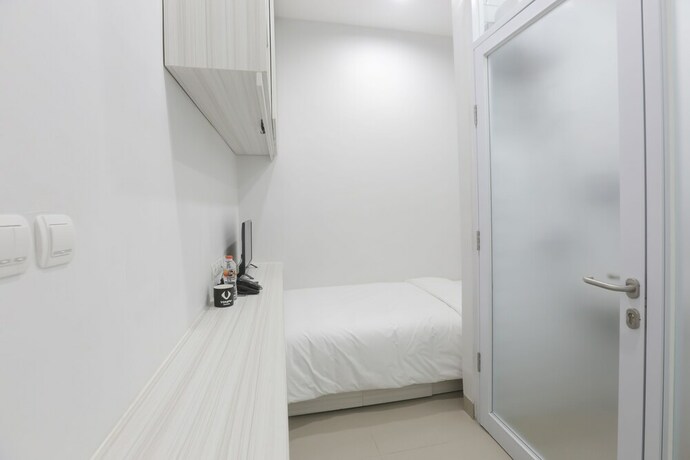 Imagen de la habitación del Hotel Voxstay Karawang, Karawang. Foto 11
