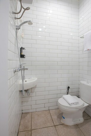 Imagen de la habitación del Hotel Voxstay Karawang, Karawang. Foto 12