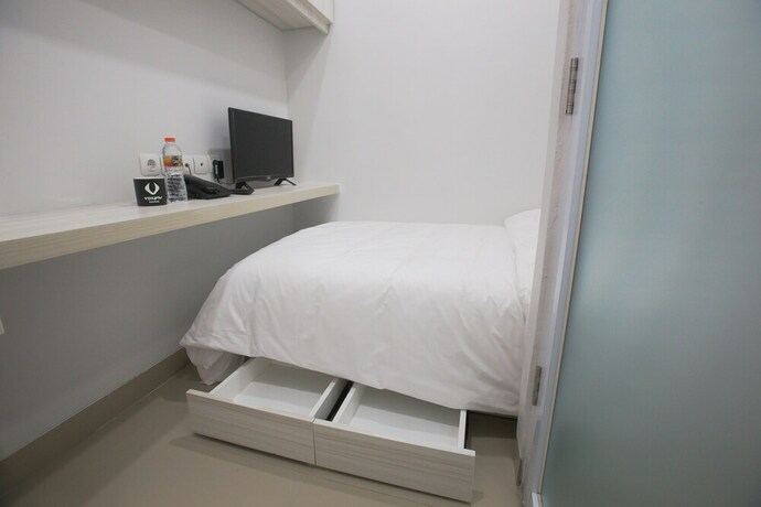 Imagen de la habitación del Hotel Voxstay Karawang, Karawang. Foto 13