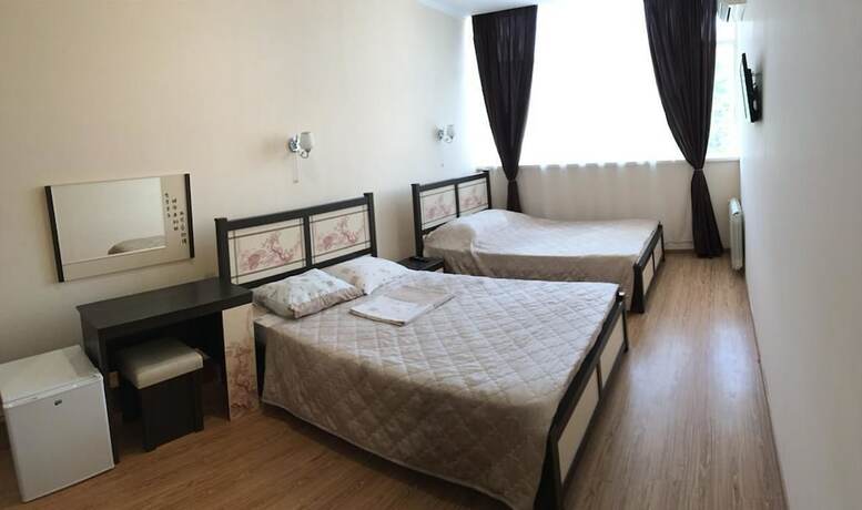 Imagen de la habitación del Hotel Voyazh Guest House. Foto 14