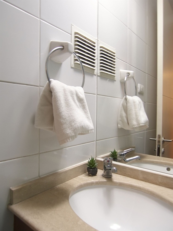 Imagen de la habitación del Hotel Vr Suite Santiago. Foto 5